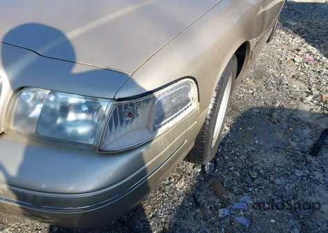 1999 Ford Crown Victoria Lx z USA, uszkodzony, nr VIN 2FAFP74W6XX228356